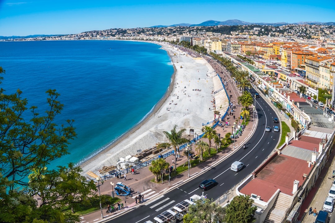 Coastal city with a beach and blue ocean.